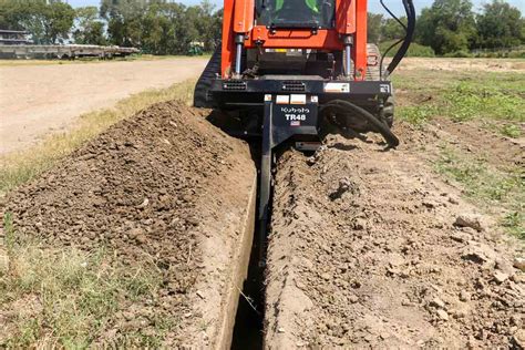 how to take chain off skid steer trencher|trencher attachment maintenance tips.